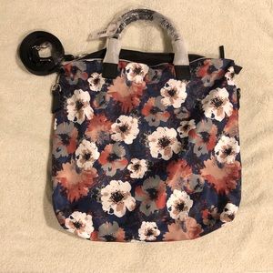 Floral bag new with tags. Excellent condition.
